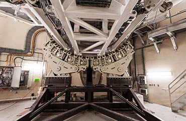 Protons move from cyclotron to gantry at two-thirds the speed of light 